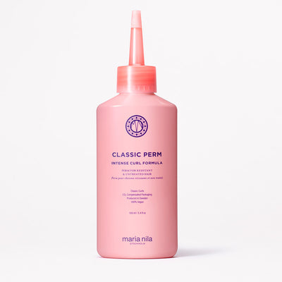 Pink bottle of Maria Nila Classic Perm Intense Curl on a white background