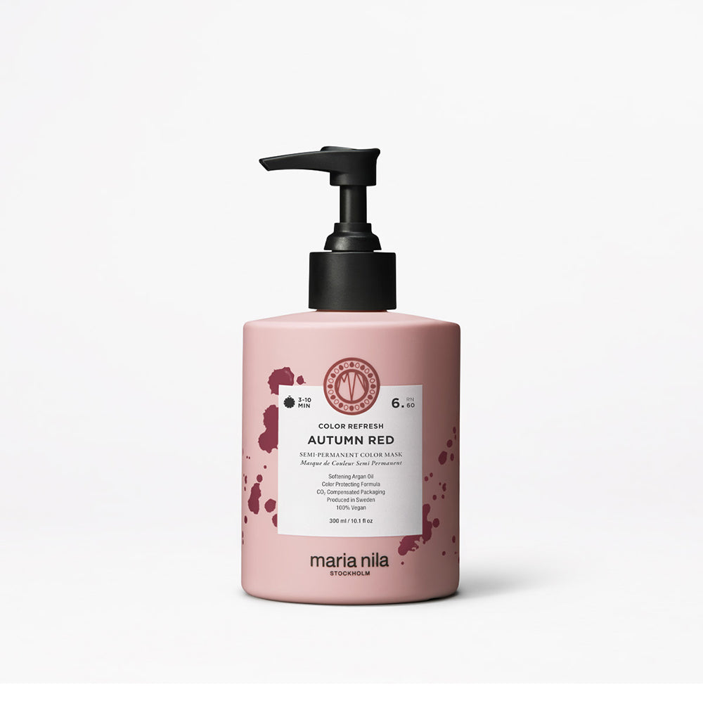 Color Refresh bottle with black pump labeled 'Autumn Red' by Maria Nila on a white background